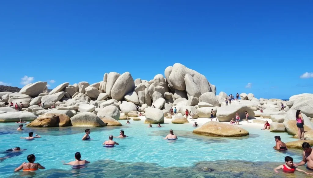 Tourists enjoying The Baths Virgin Gorda on a sunny day with perfect weather conditions