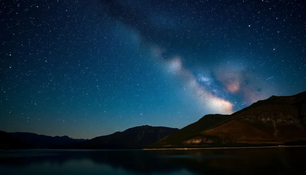Night sky with stars over Green Mountain Reservoir, mountains silhouetted Night sky with stars over Green Mountain Reservoir, mountains silhouetted