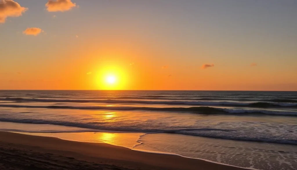 Summer sunset at South Carlsbad State Beach California with golden light reflecting on the water