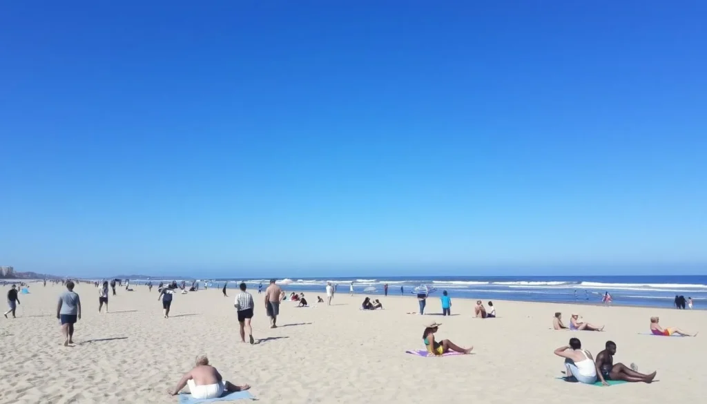 Sunny day at Seal Beach with visitors enjoying the sand and ocean waves