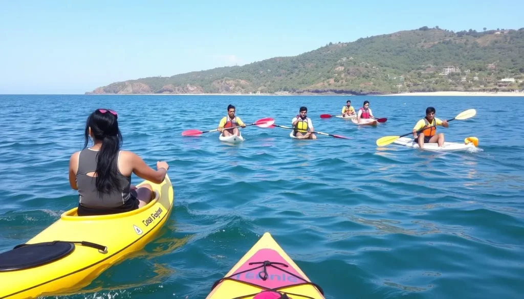 Tourists enjoying kayaking and paddleboarding at Kudle Beach with maximum 5 watercraft visible