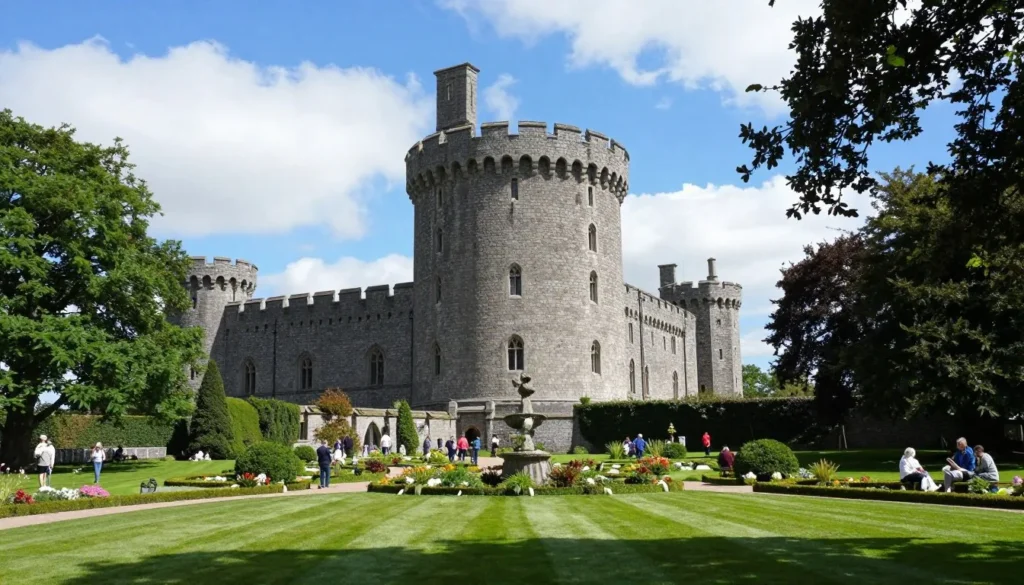 Blarney Castle tower surrounded by lush green gardens and ancient trees