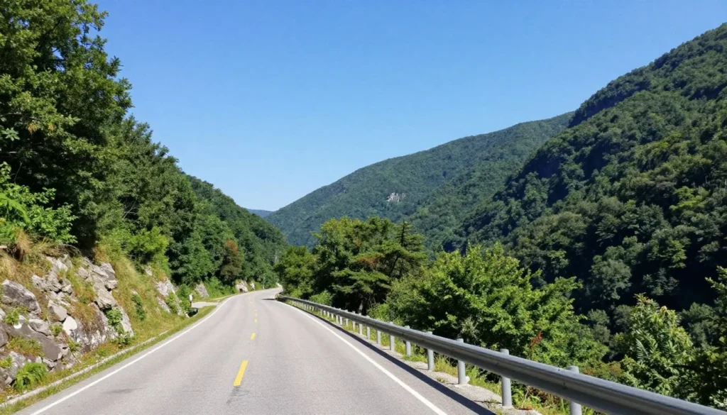 Cumberland Gap National Historical Park entrance with mountains and winding road through valley Cumberland Gap National Historical Park entrance with mountains and winding road through valley