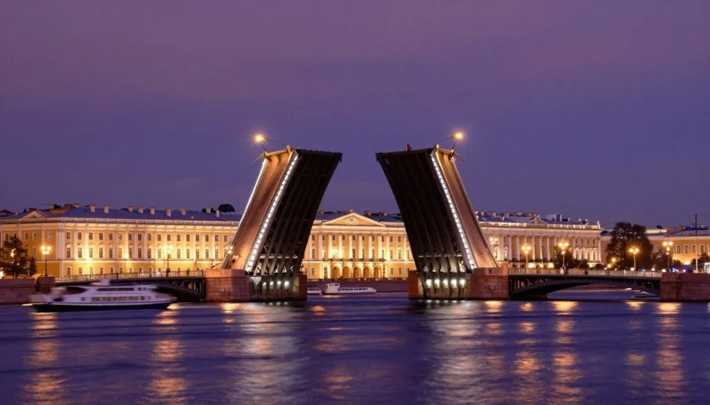 Drawbridge raised over the Neva River at night during the white nights festival showing the spectacular sight of the split bridge with historic buildings lit up in the background Drawbridge raised over the Neva River at night during the white nights festival showing the spectacular sight of the split bridge with historic buildings lit up in the background