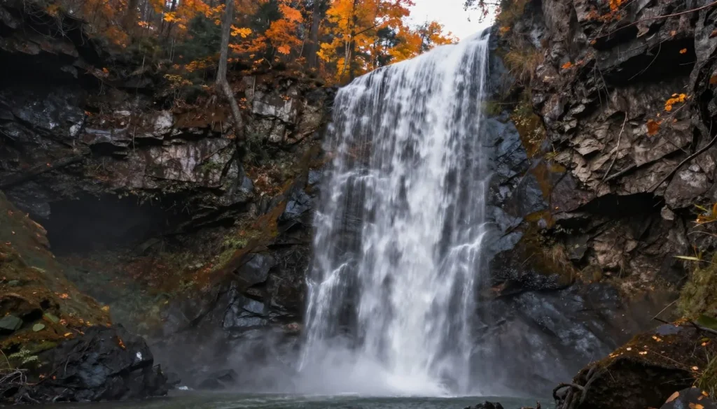 Linville Falls cascading over rocky cliffs into gorge Linville Falls cascading over rocky cliffs into gorge