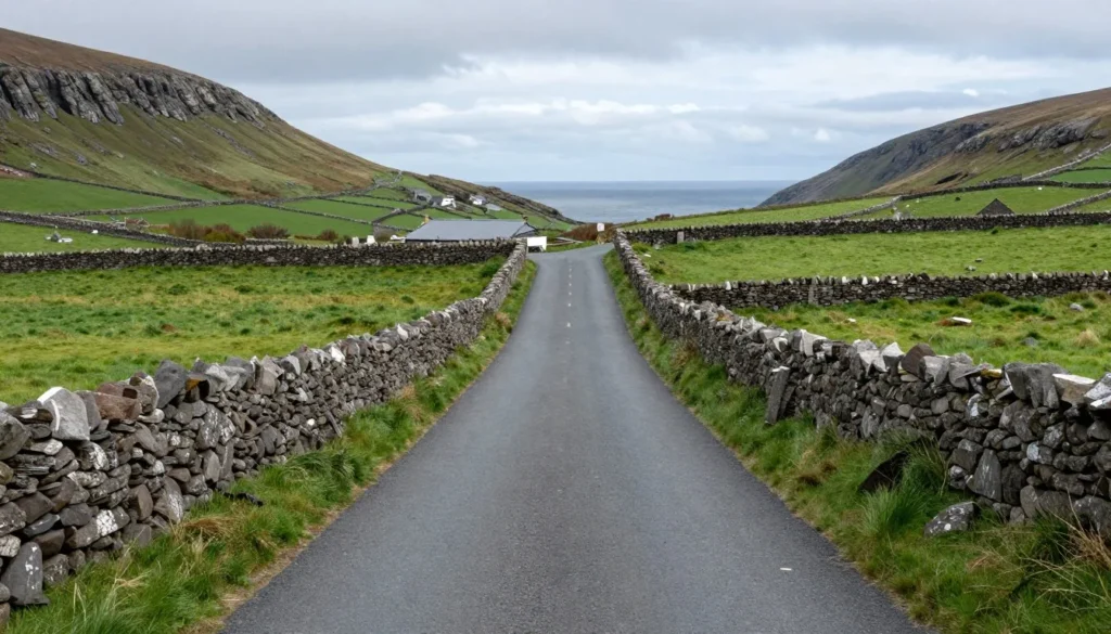 Single-track coastal road on Dingle Peninsula Ireland with passing place and stone walls