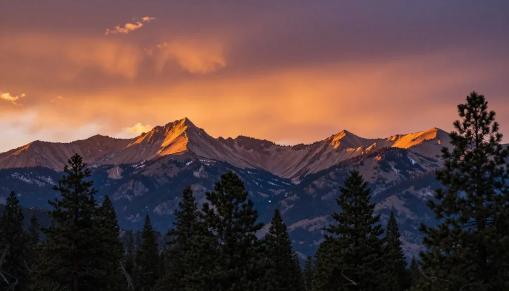 Sunset over Spring Mountains with golden light illuminating alpine peaks Sunset over Spring Mountains with golden light illuminating alpine peaks