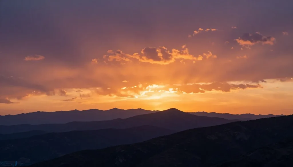 Sunset view from Mount Nebo showing layered mountain ridges in silhouette