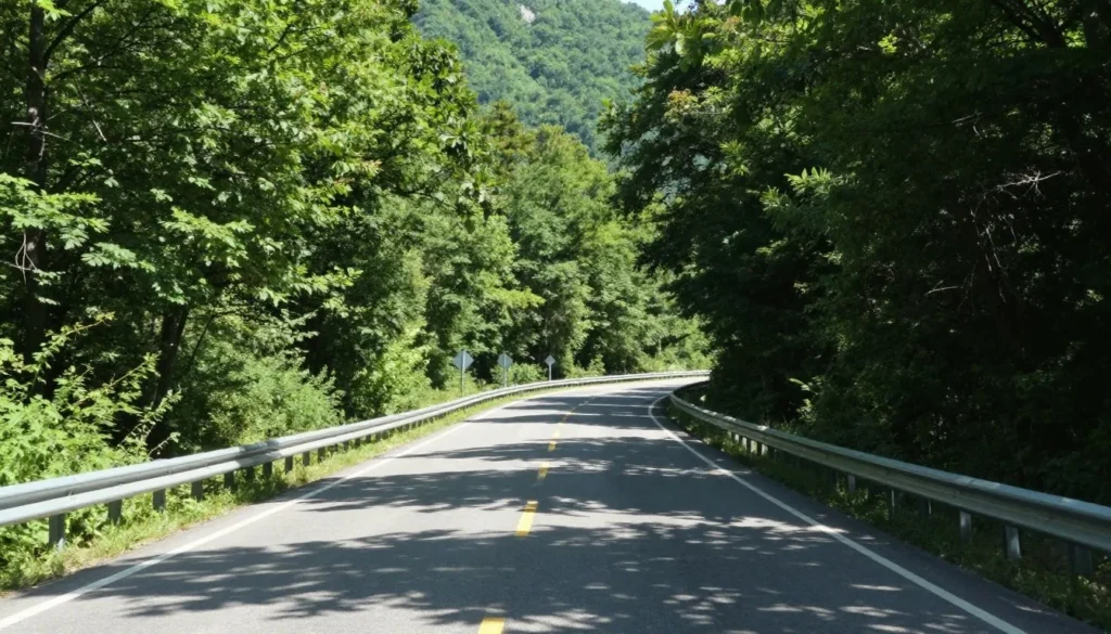 Winding mountain road through Cullasaja Gorge with forest on both sides Winding mountain road through Cullasaja Gorge with forest on both sides